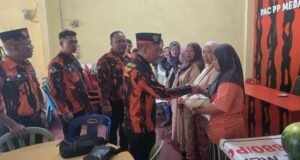 Pemuda Pancasila Medan Sunggal Tak Pernah Lelah Berbagi, Ratusan Warga Kembali Terima Takjil dan Sembako di Ramadhan 1447 H